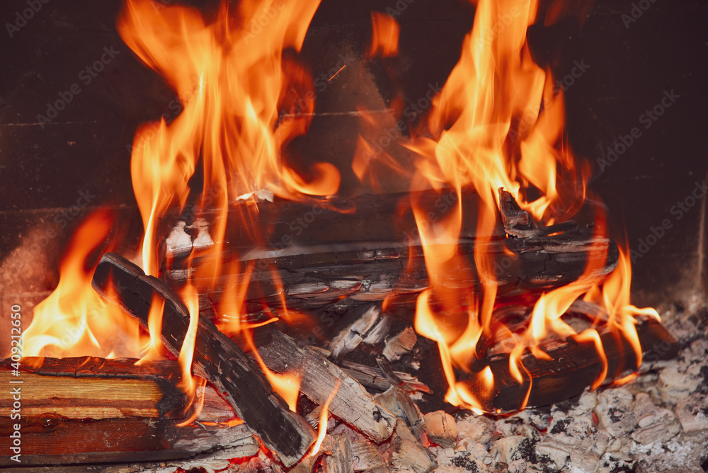 Blazing fire in fireplace. Blazing fire in fireplace.