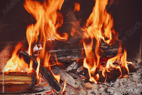 Blazing fire in fireplace.