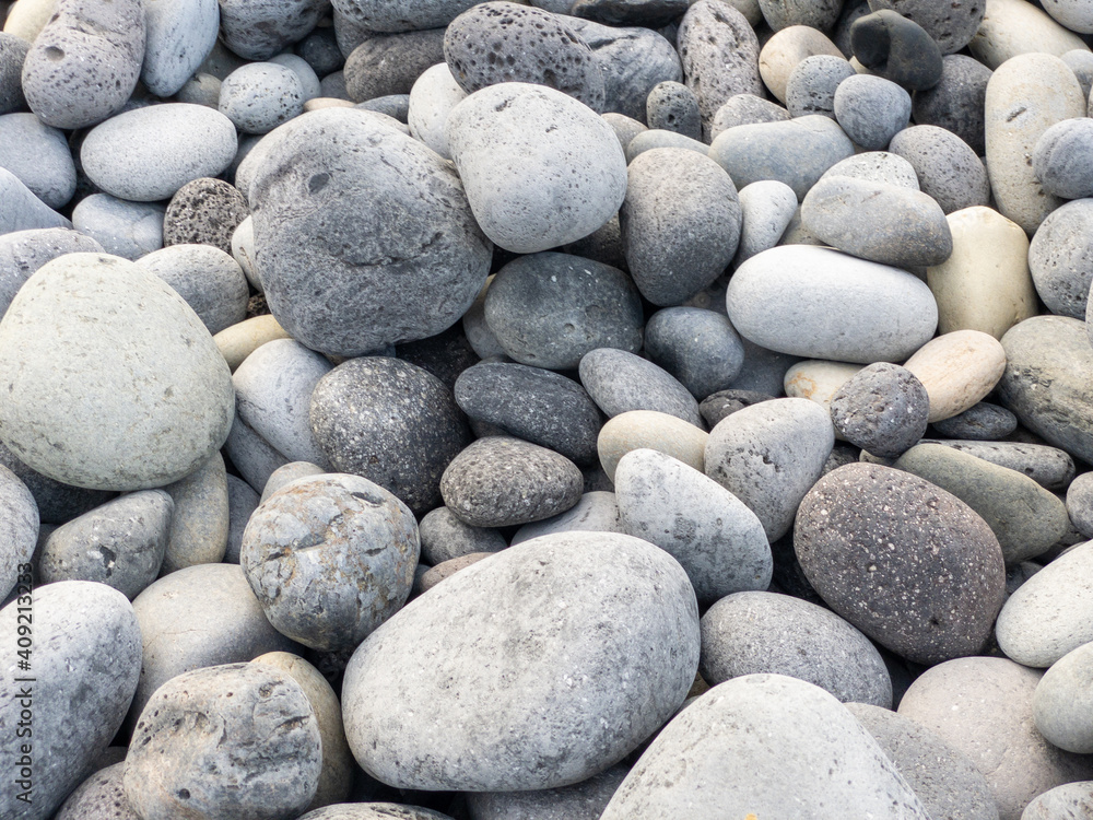 Different colors of pebbles on Reunion island east sea shore Different colors of pebbles on Reunion island east sea shore