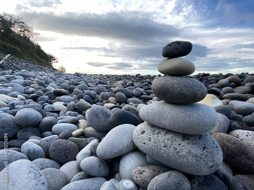 Zen-like stack of pebbles, meditation mood on shore