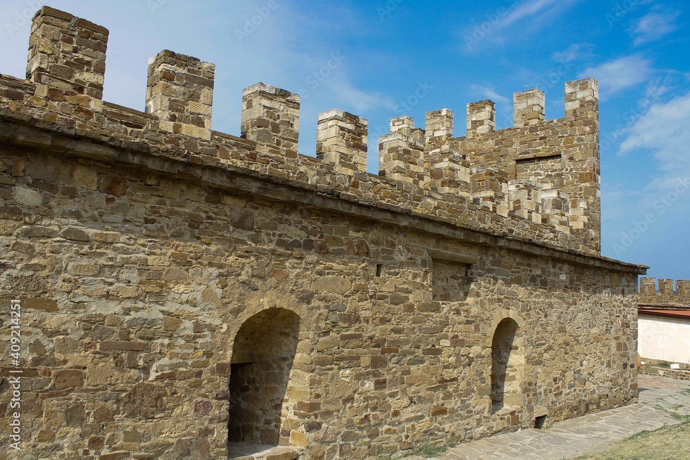 old castle in the middle of the sea