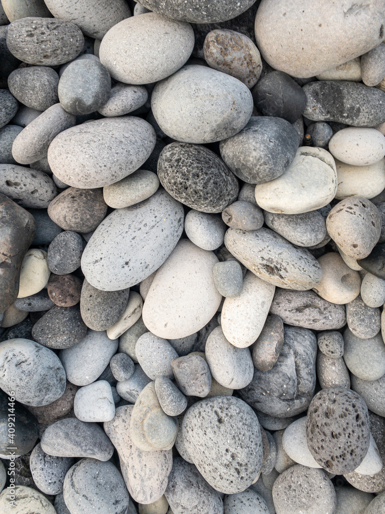 Different colors of pebbles on Reunion island east sea shore Different colors of pebbles on Reunion island east sea shore
