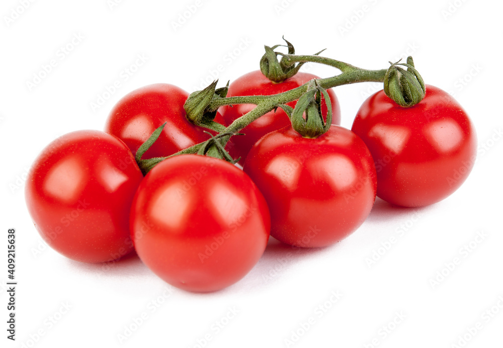Fresh cherry tomatoes with a sprig isolated on a white background. View from another angle in the portfolio. Fresh cherry tomatoes with a sprig isolated on a white background. View from another angle in the portfolio.