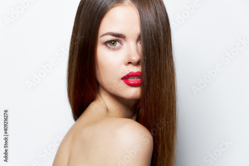 Woman with long hairstyle portrait of a model lipstick isolated 