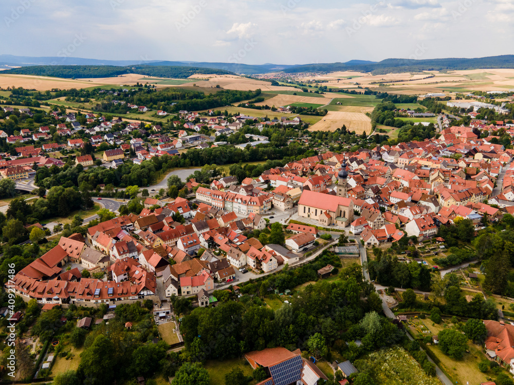 Aerial view of the old town of the city Mellrichstadt in Germany, Bavaria on a late spring afternoon