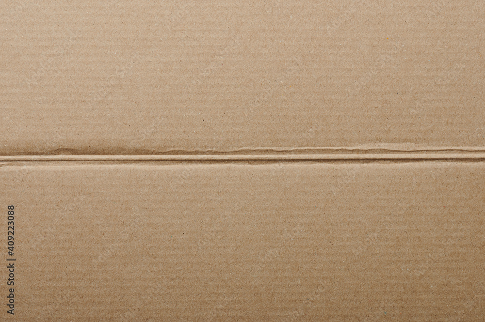 Fototapeta premium Straight bend line on carton paper surface