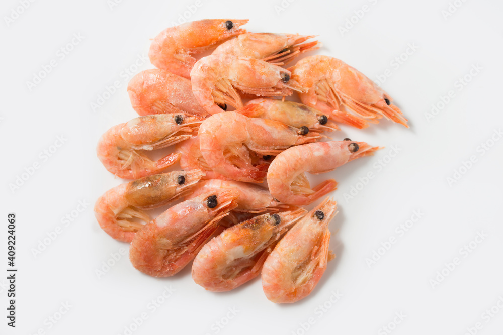 boiled frozen shrimps on a white background boiled frozen shrimps on a white background