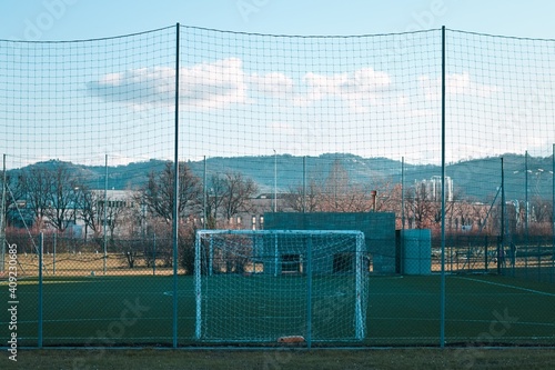 A football goal in a shady futsal field (Pesaro, Italy, Europe)