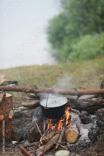 A casserole over a fire. 