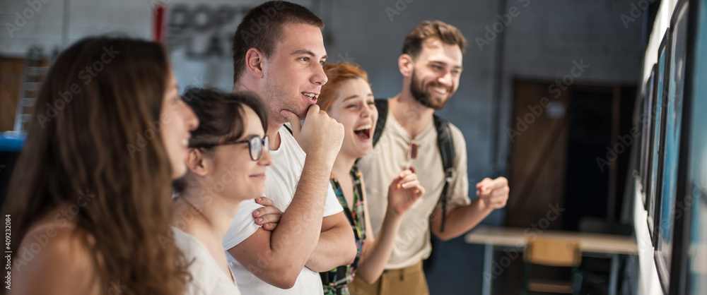 Fototapeta premium Group of friends in modern art exhibition gallery hall contemplating artwork. Abstract painting
