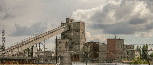 old cement factory facilities in Kharkiv, Ukraine, overcast sky
