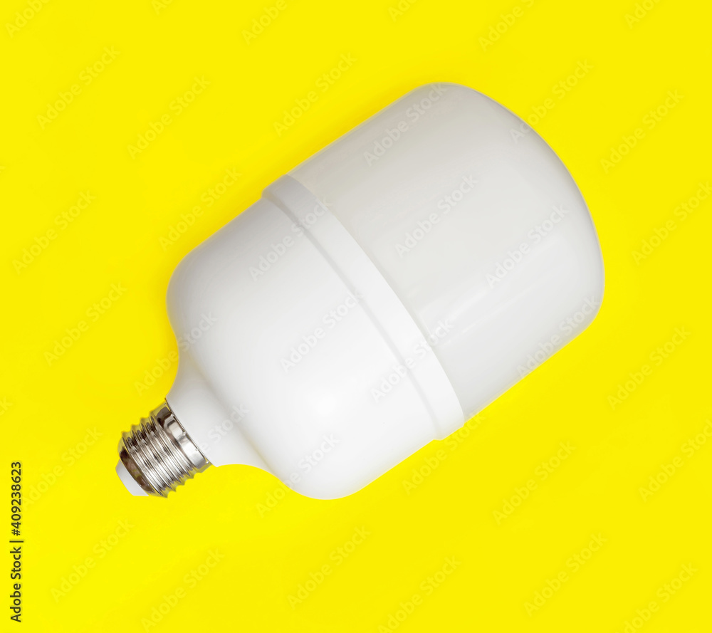 A high power LED bulb over the yellow background.