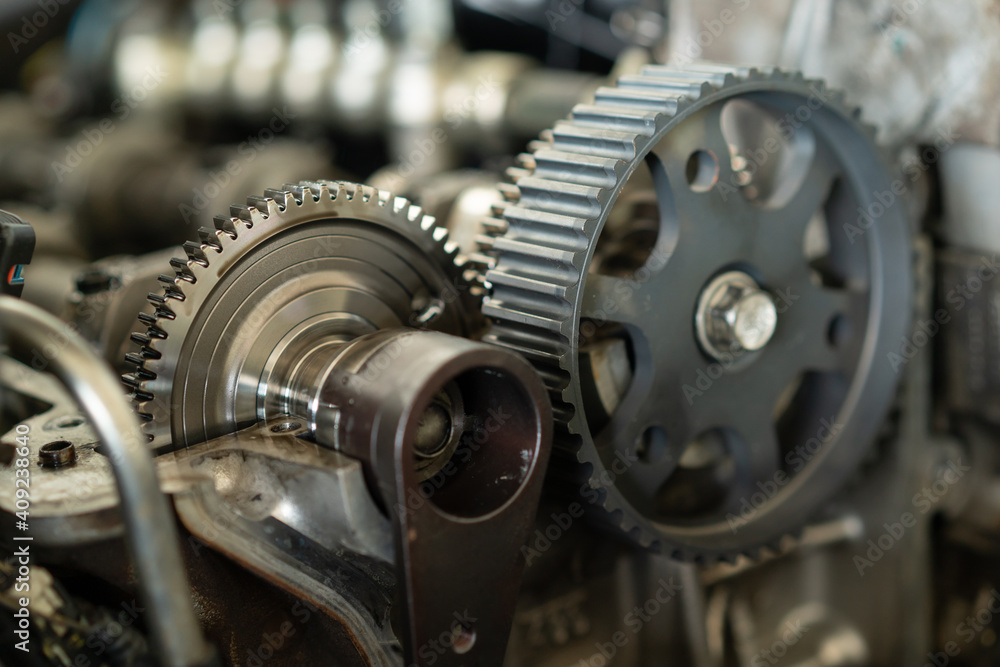 Gear inside an car engine. Mechanic part of gear in an engine. Gear inside an car engine. Mechanic part of gear in an engine.