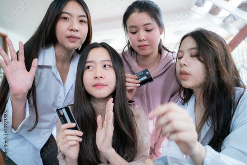 Group of women friend holding credit card feel wowo for online shopping