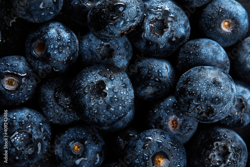 Foto Fresh natural antioxidant blueberries pile, macro detailed close up