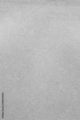 Grainy vertical grey background paper texture