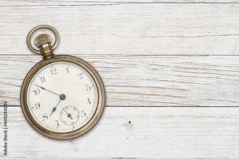 Old time mockup with a pocket watch on weathered wood Old time mockup with a pocket watch on weathered wood