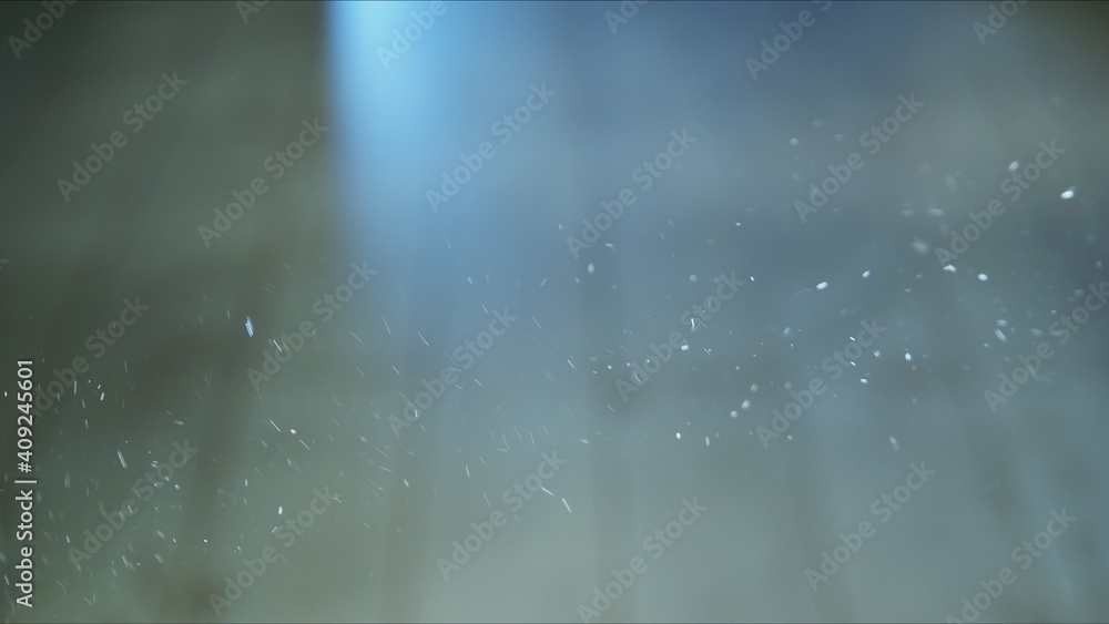 Small airborne particles moving around in the light - obrazy, fototapety, plakaty 