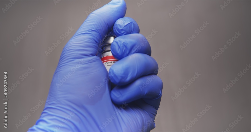 Vaccine in human hands closeup footage