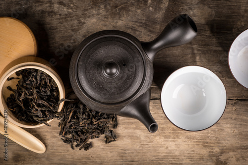 preparation of green loose tea in traditional Japanese ceramics