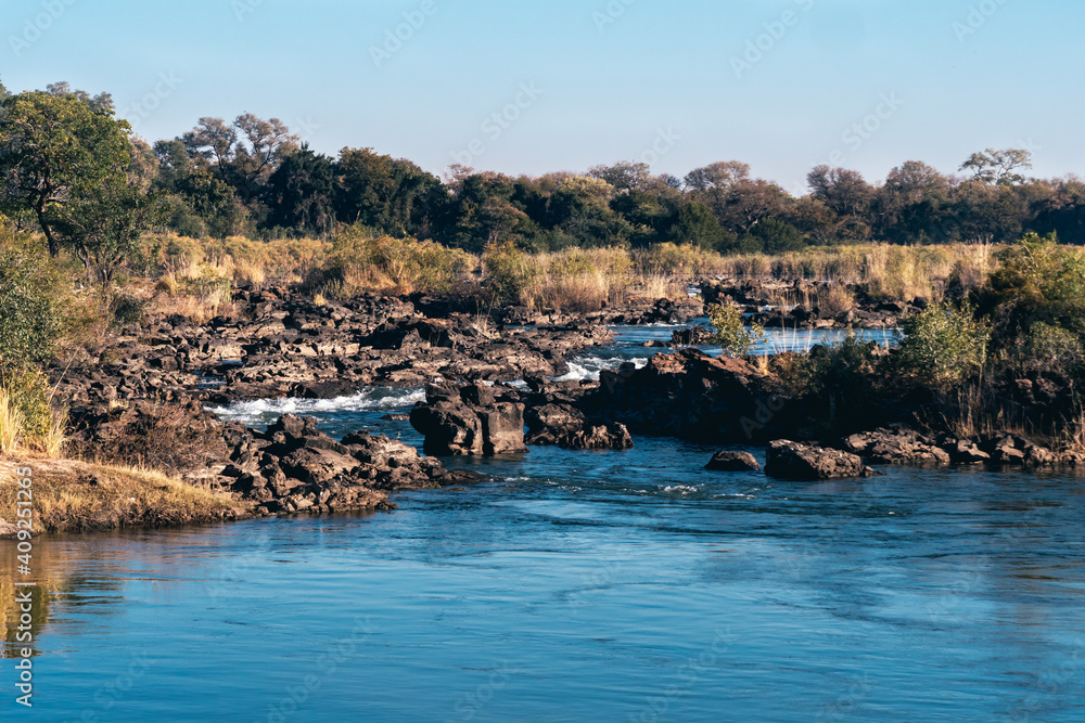 Fototapeta premium Popa Falls, Waterfall in Bwabwata National Park, Namibia