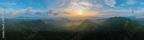 Aerial view, Beautiful Panorama landscape sunrise over peak Mountain with warm light sunrise Mae Moh Lampang, Thailand