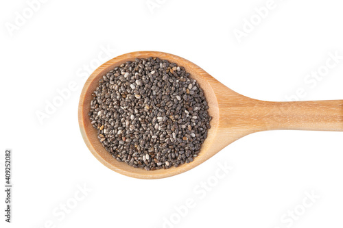 Wooden spoon with black chia seeds isolated on white background with clipping path, Top view
