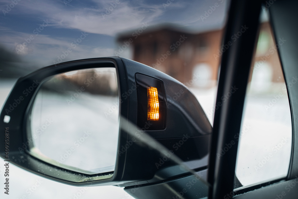 Modern car rear view mirror with drive assistance sensor. Modern car rear view mirror with drive assistance sensor.