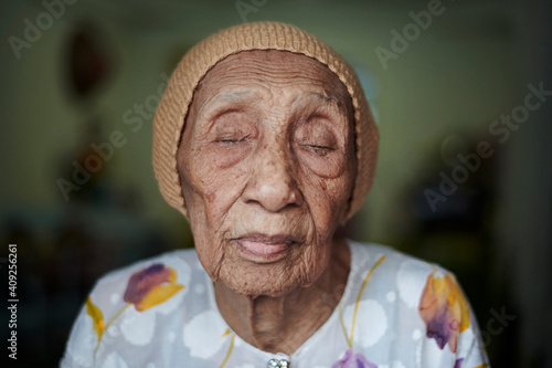 Portrait of an elderly Malay female