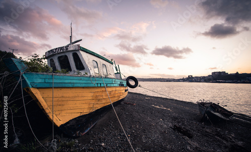 Old Wooden Boat During Low Tide in Castro, Chiloe, Chile