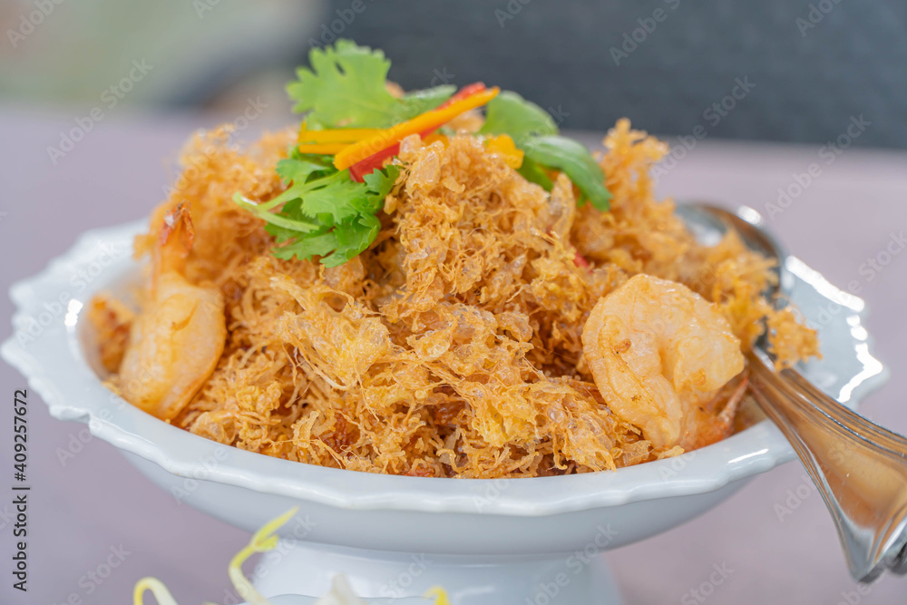 Fried shrimp thai style in deck.