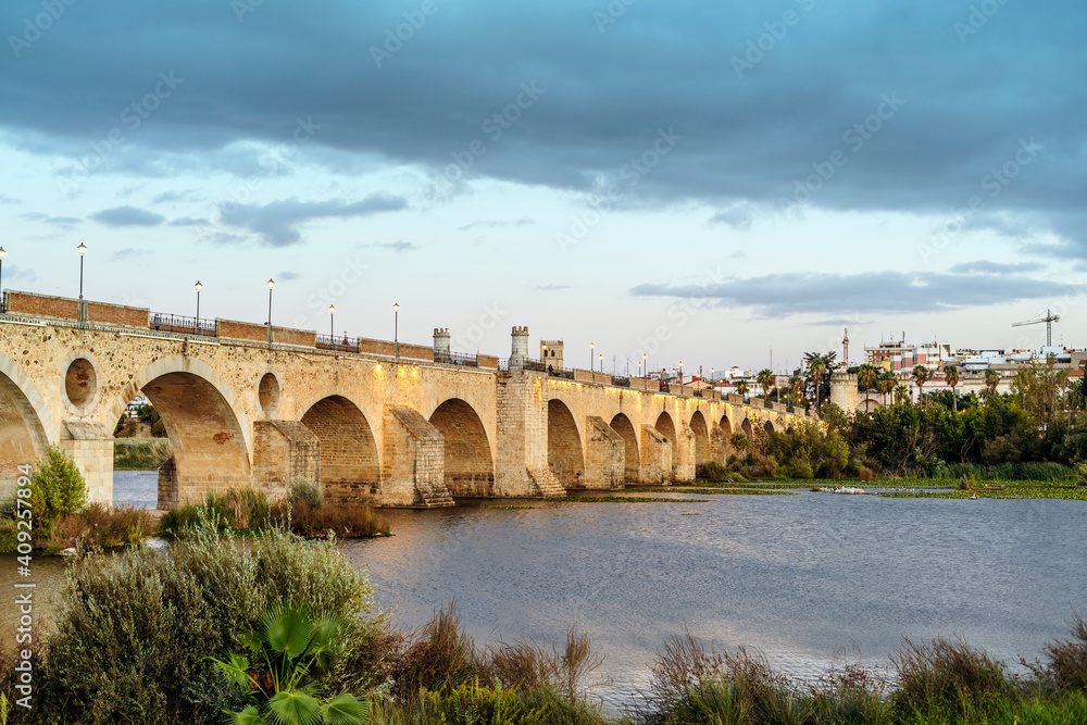 Medieval Palmas Bridge over Guadiana River in Badajoz, Spain