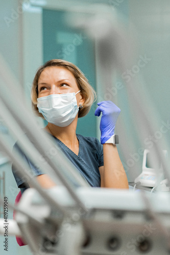 dentistry under general anesthesia. The dentist treats the patient under general anesthesia. dentist and assistant in the process.