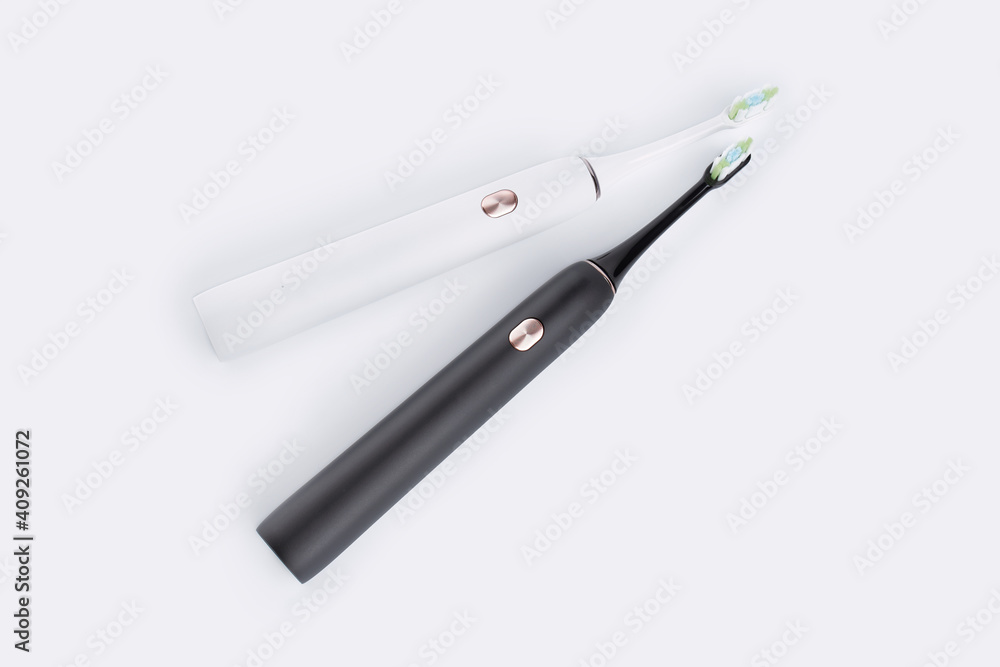 Smart electric toothbrush. Modern technology for health. Healthy teeth. Dentistry. Concept of professional oral care and healthy teeth by using ultrasonic smart toothbrush. Smart electric toothbrush. Modern technology for health. Healthy teeth. Dentistry. Concept of professional oral care and healthy teeth by using ultrasonic smart toothbrush.