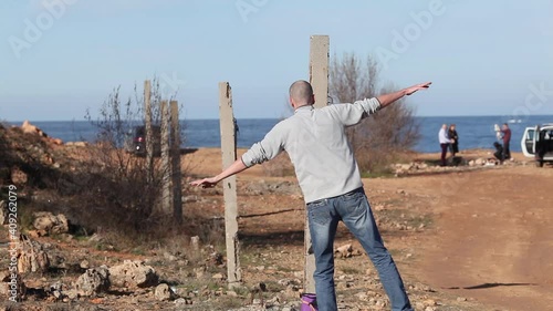 a man walks on a sling