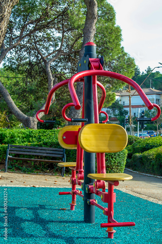 gym equipment on a city playground on a warm sunny day