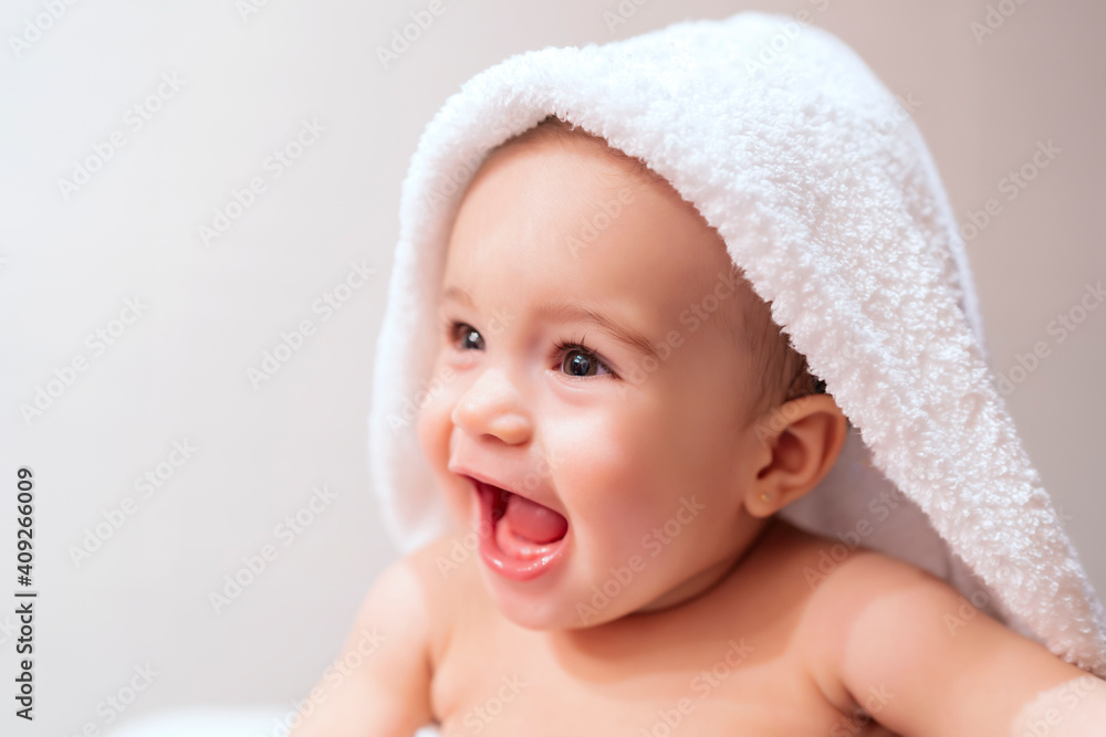 beautiful baby in his towel after a bath beautiful baby in his towel after a bath