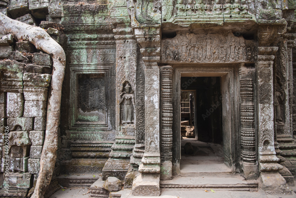 entrance to a temple at the ancient ruins of Angkor Wat entrance to a temple at the ancient ruins of Angkor Wat