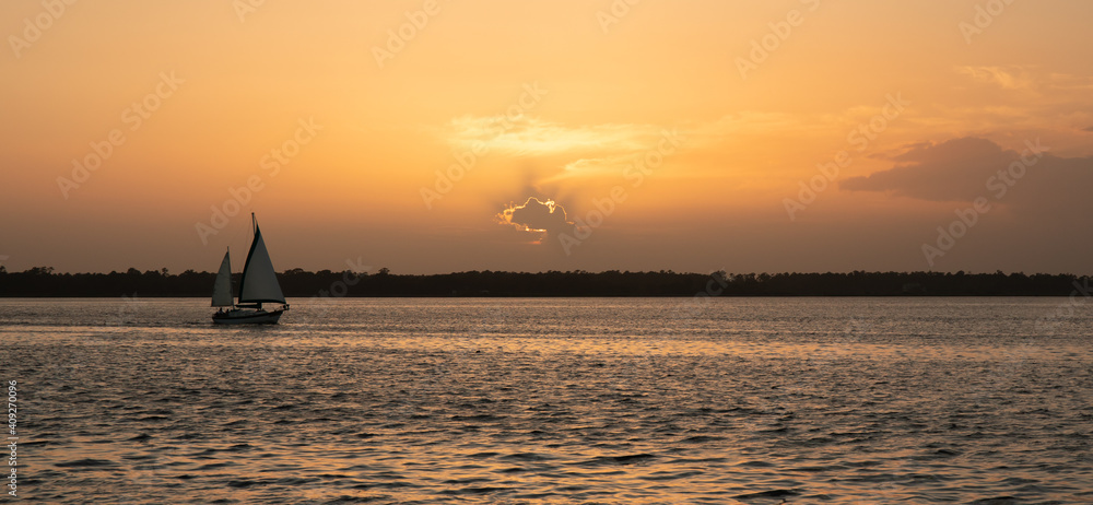 Sailing at Sunset on Cape Fear River Sailing at Sunset on Cape Fear River