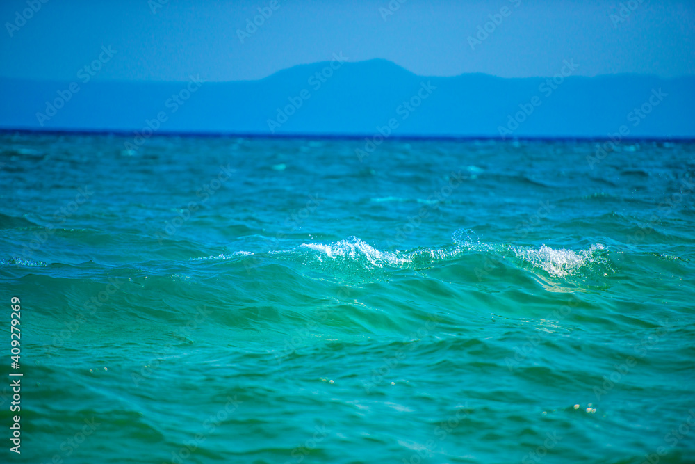 Turquoise waves at the sea