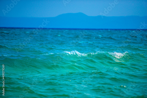 Turquoise waves at the sea