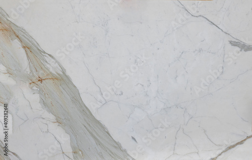 Il Calacatta Bettogli è un marmo con fondo bianco caldo con venature grigio-marroni oro. Questo esclusivo marmo italiano è estratto dalla cava di Bettogli a Carrara photo