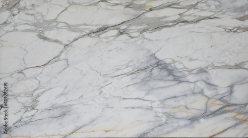 Calacatta Borghini è un marmo italiano, estratto nelle cave di Carrara, molto pregiato e elegante di colore bianco e venature photo