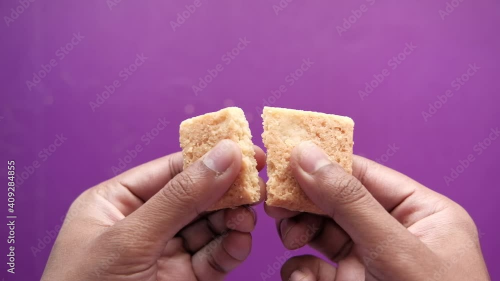 breaking sweet cookies on color background breaking sweet cookies on color background