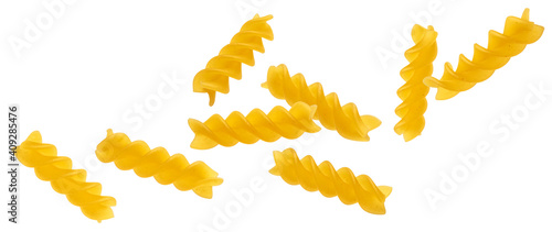 Falling fusilli pasta isolated on white background photo