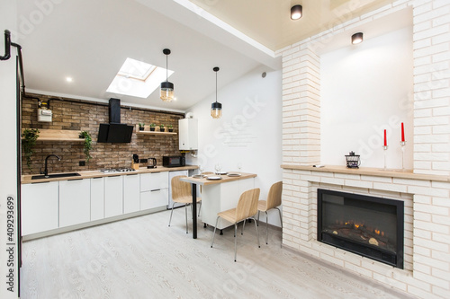 Interior photography luxury kitchen studio in loft style room in white  with kitchen furniture luxury
