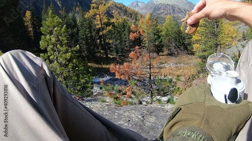 Altai hiker park sit and drink water