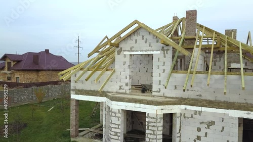Wallpaper Mural Aerial view of a private house with aerated concrete brick walls and wooden frame for future roof. Torontodigital.ca