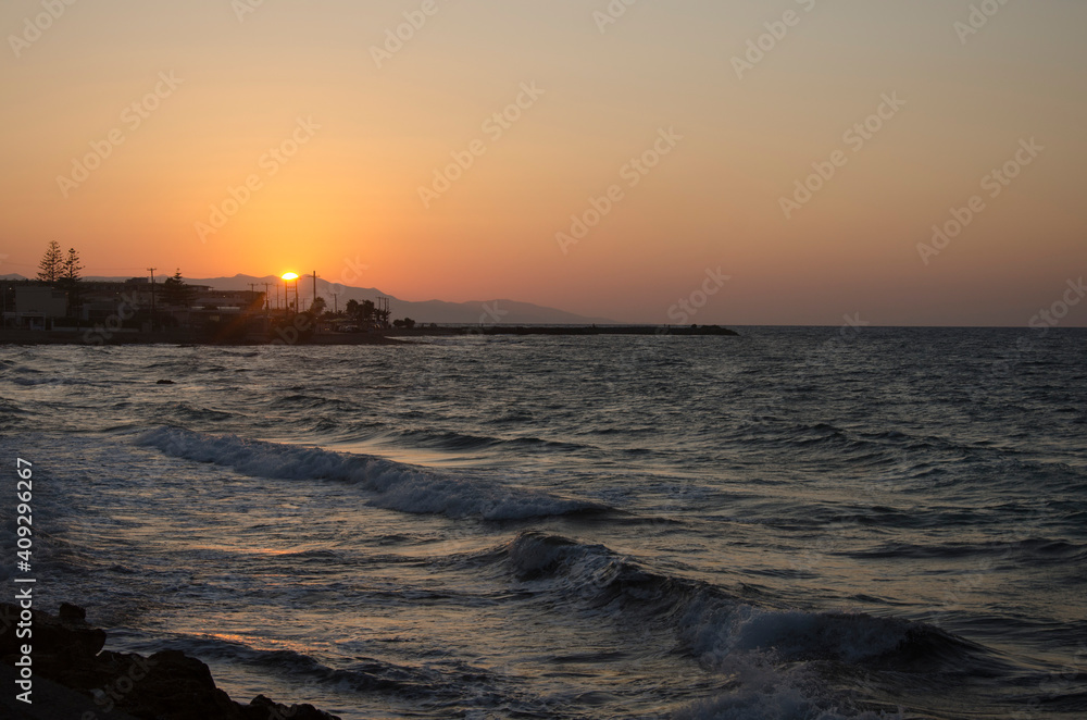 Obraz premium sunset over the sea, Gouves, Crete, Greece