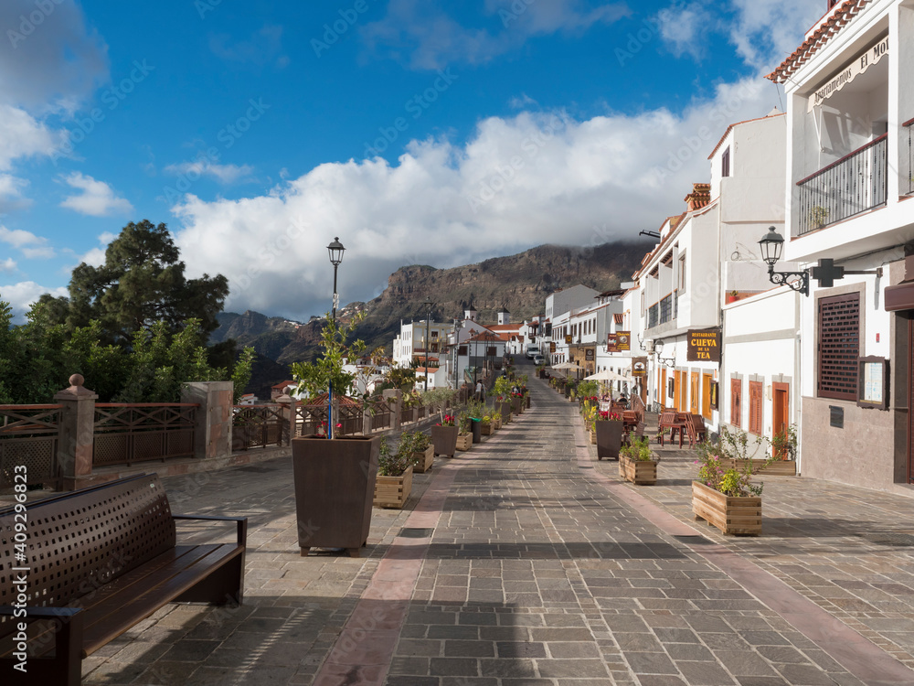 Tejeda, Gran Canaria, Canary Islands, Spain December 15, 2020: Main street in Tejeda Picturesque Canarian village at inland mountain valley on sunny day